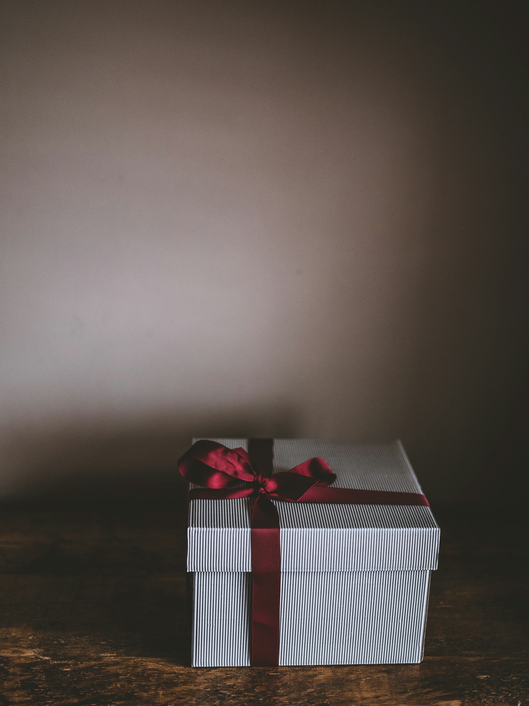 Plain striped gift box with ribbon